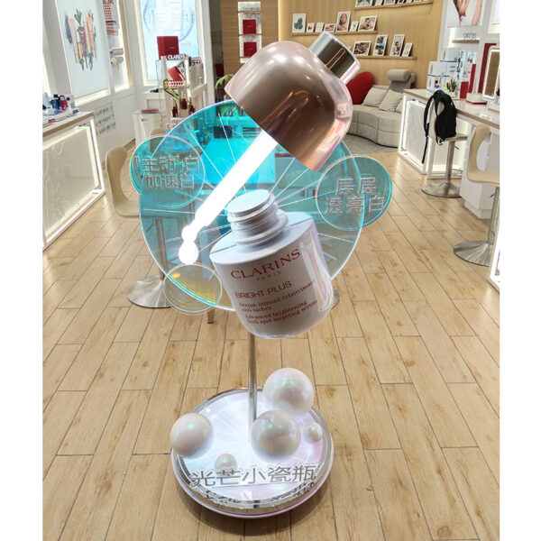 Clarins unique totem display with big factice